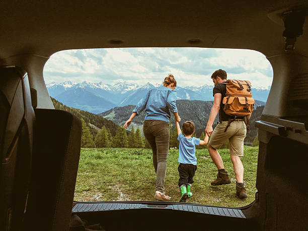 young family enjoying the nature of the austrian alps